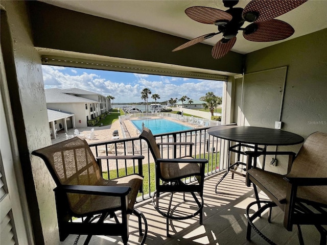 balcony featuring ceiling fan