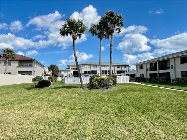 view of community featuring a lawn