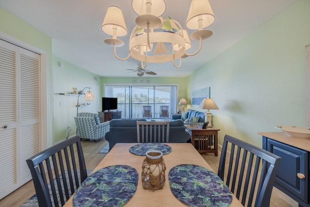 dining area featuring ceiling fan and light hardwood / wood-style flooring