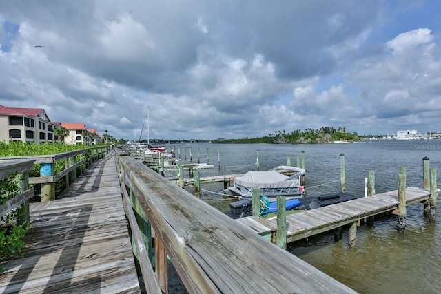 view of dock with a water view