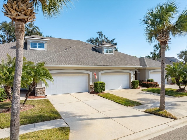 view of front of property featuring a garage