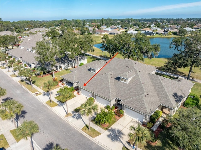 drone / aerial view featuring a water view