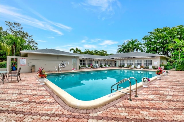 view of swimming pool featuring a patio