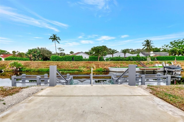 view of patio featuring a water view