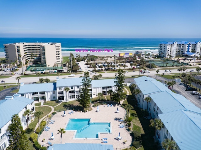 aerial view featuring a water view and a view of the beach