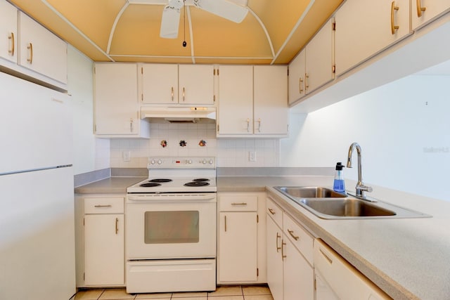 kitchen featuring tasteful backsplash, white cabinetry, sink, light tile patterned floors, and white appliances