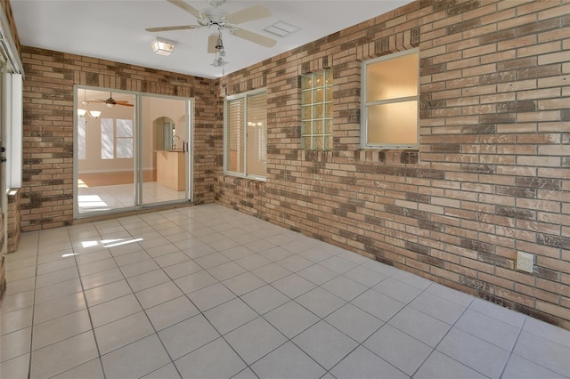 view of patio with ceiling fan