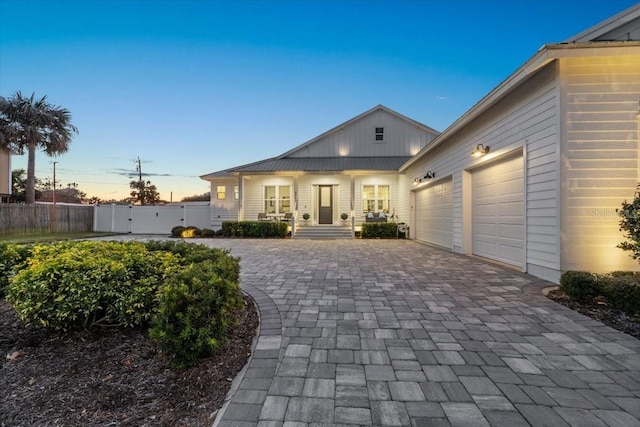 view of front of home with a garage