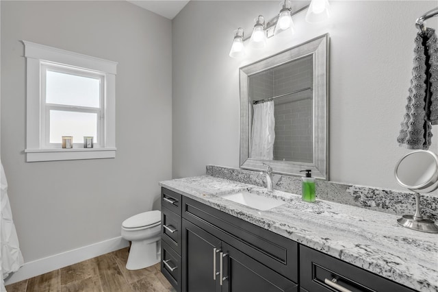 bathroom with vanity, a shower with curtain, wood-type flooring, and toilet