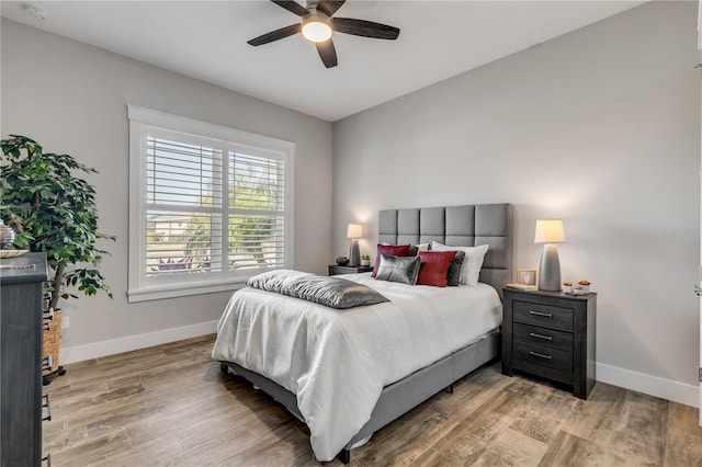 bedroom featuring ceiling fan and light wood-type flooring