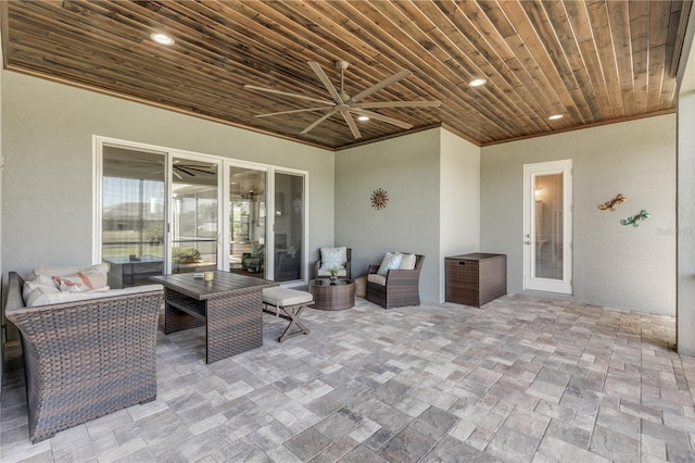 view of patio featuring ceiling fan and outdoor lounge area