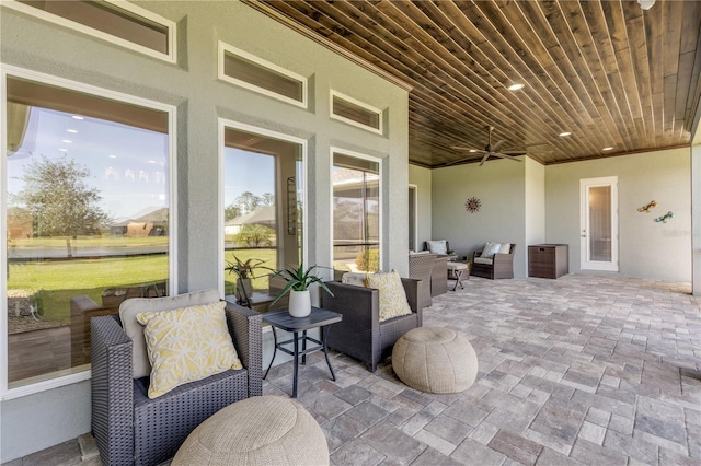 interior space with ceiling fan and outdoor lounge area