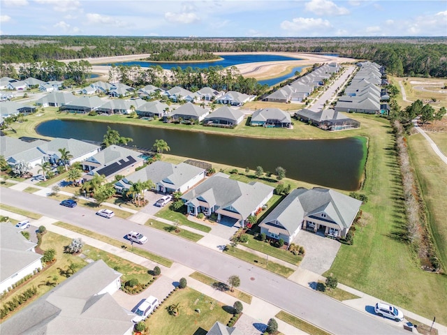 drone / aerial view featuring a water view