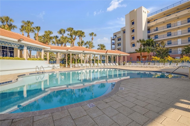 view of pool featuring a patio