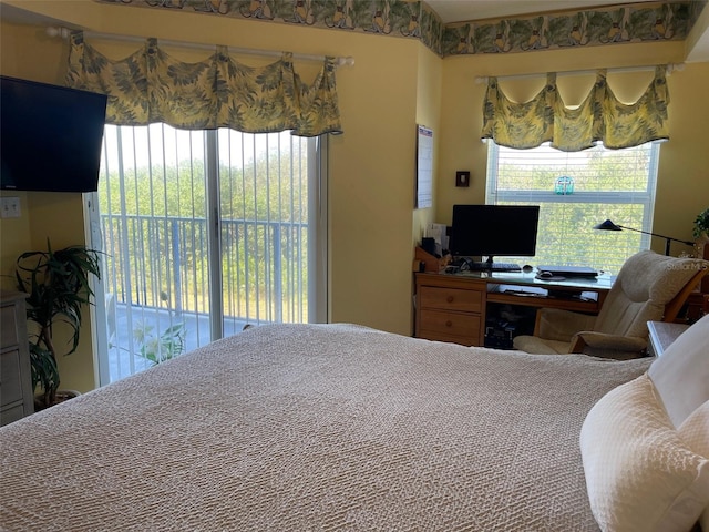 bedroom with access to outside