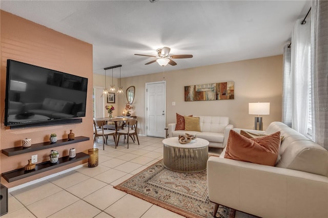 tiled living room featuring ceiling fan