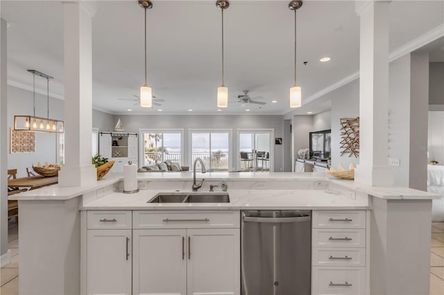 kitchen with white cabinetry, stainless steel dishwasher, sink, and pendant lighting