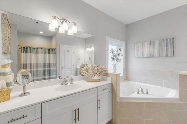 bathroom with independent shower and bath and vanity