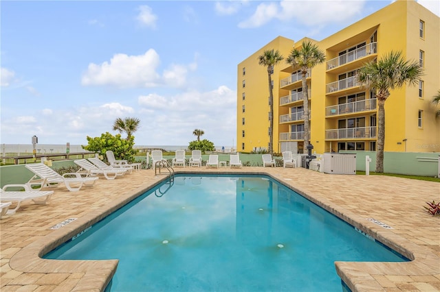 view of swimming pool featuring a patio