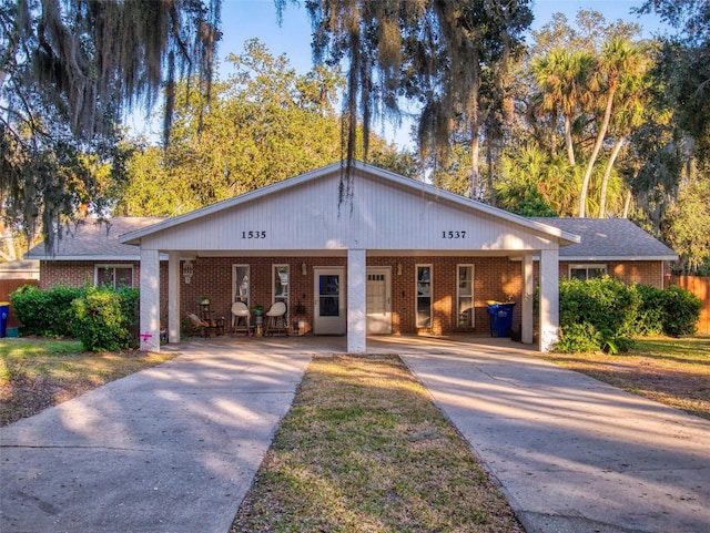 view of front of home featuring a carport