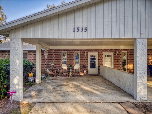 property entrance with a patio area