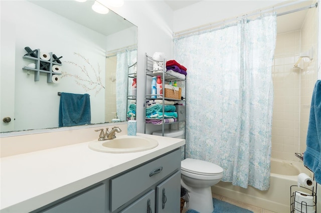 full bathroom featuring vanity, shower / bathtub combination with curtain, and toilet