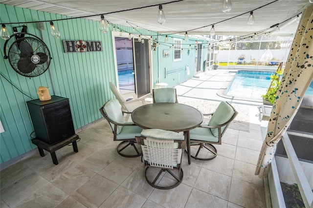 view of patio / terrace with a fenced in pool