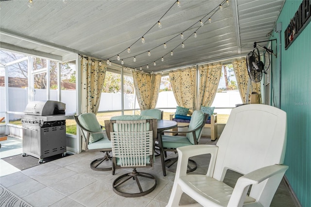 sunroom / solarium featuring plenty of natural light