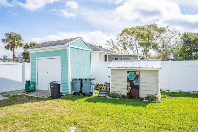 view of outdoor structure with a yard