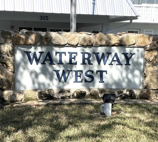 view of community sign