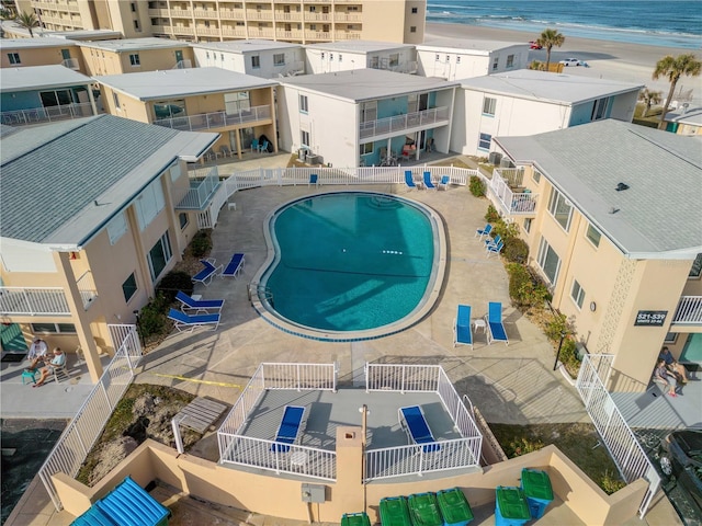 drone / aerial view with a view of the beach and a water view