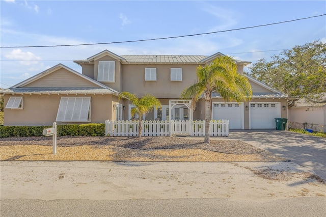 view of front of property featuring a garage