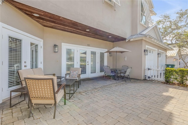 view of patio featuring french doors