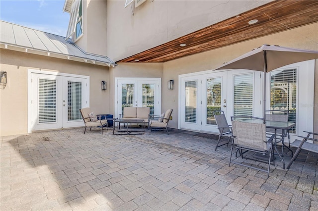 view of patio featuring outdoor lounge area and french doors