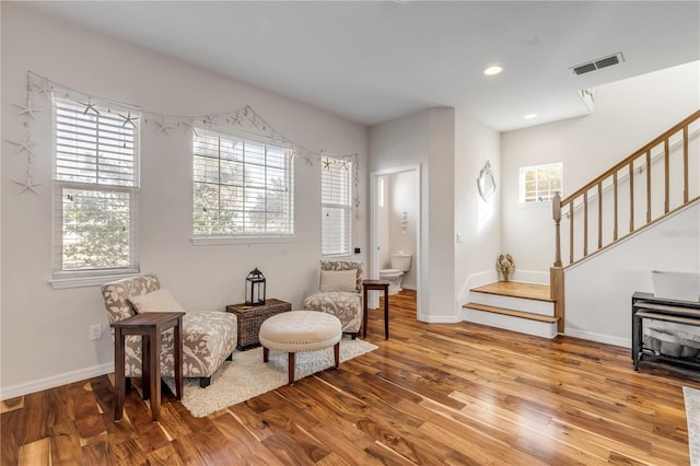 sitting room featuring hardwood / wood-style flooring