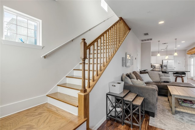 living room with dark hardwood / wood-style flooring