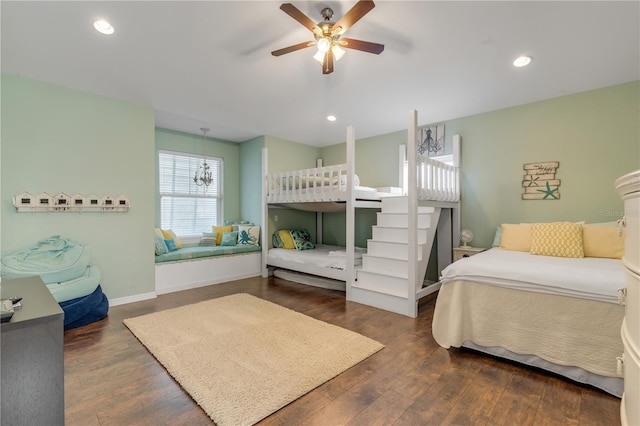 bedroom featuring dark hardwood / wood-style flooring and ceiling fan