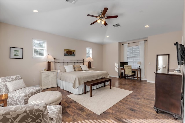 bedroom featuring lofted ceiling, dark wood-type flooring, and ceiling fan