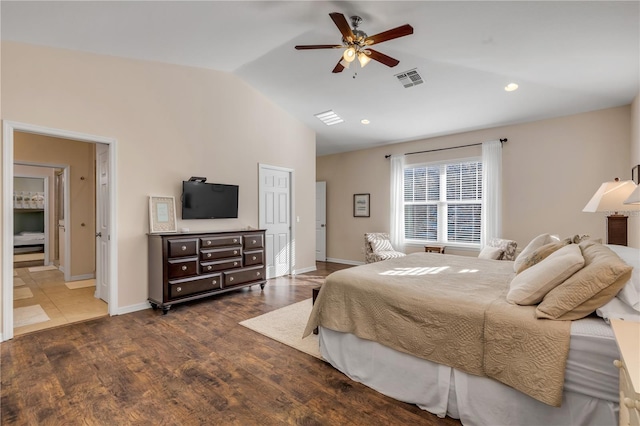 bedroom featuring vaulted ceiling, hardwood / wood-style floors, and ceiling fan