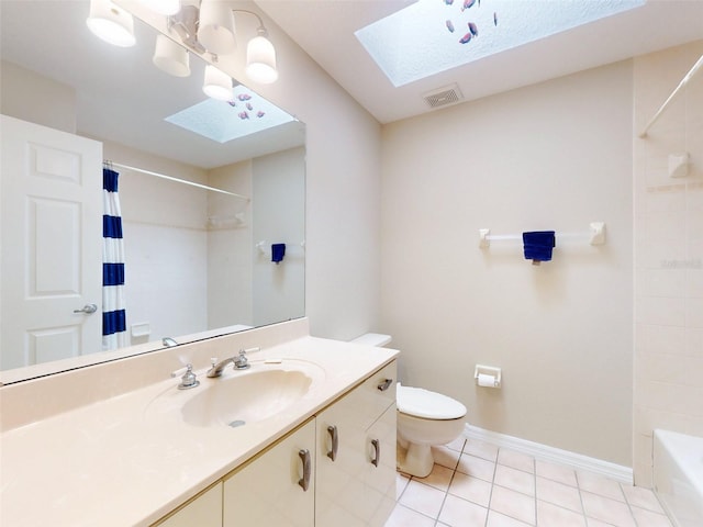 full bathroom with shower / tub combo, tile patterned flooring, a skylight, vanity, and toilet