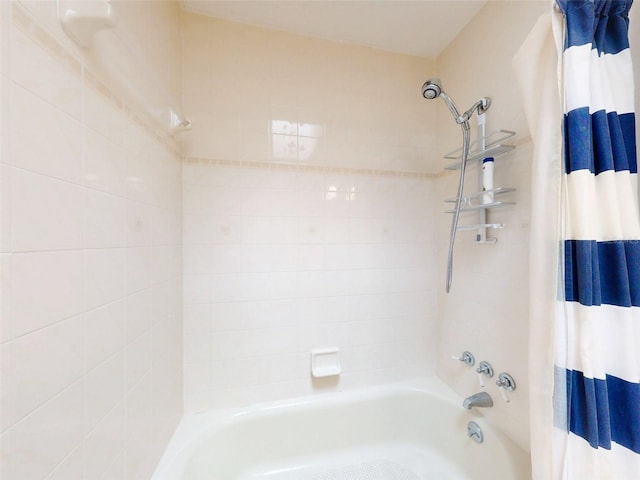 bathroom featuring shower / bath combination with curtain