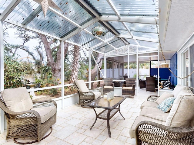 sunroom with lofted ceiling