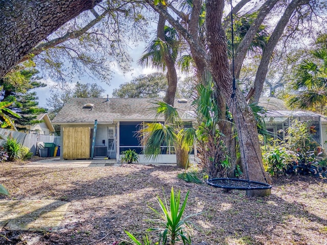 view of front of home featuring a lanai