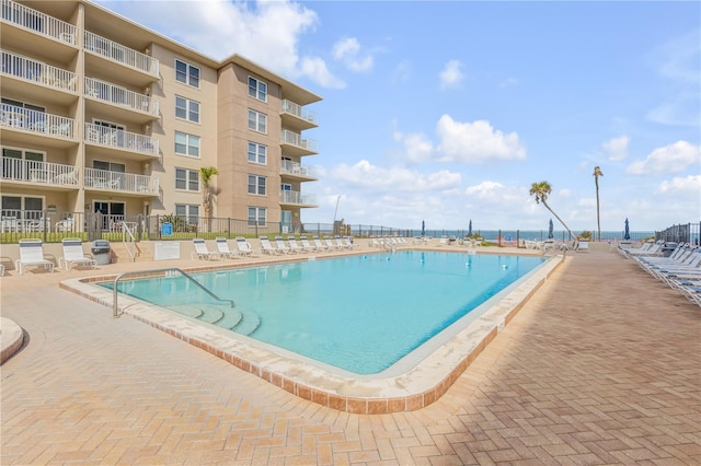 view of pool featuring a patio area