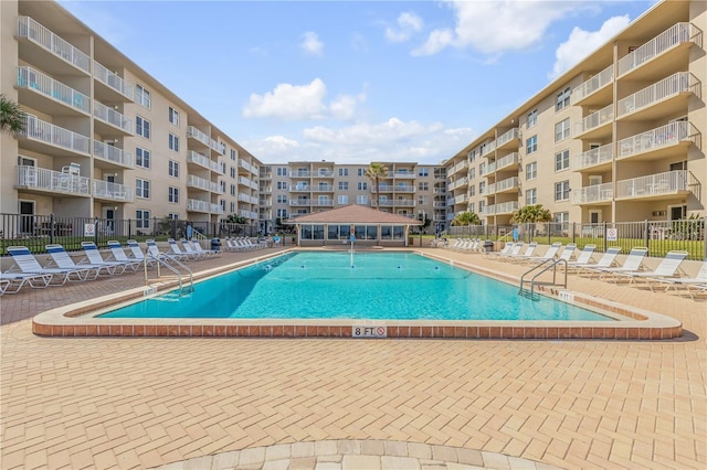 view of swimming pool featuring a patio