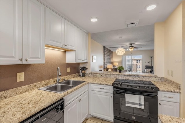 kitchen with white cabinets, kitchen peninsula, sink, and black appliances