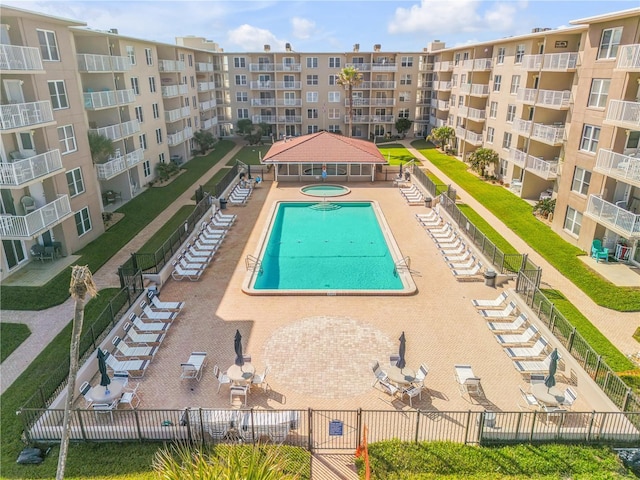 view of swimming pool featuring a patio and a gazebo