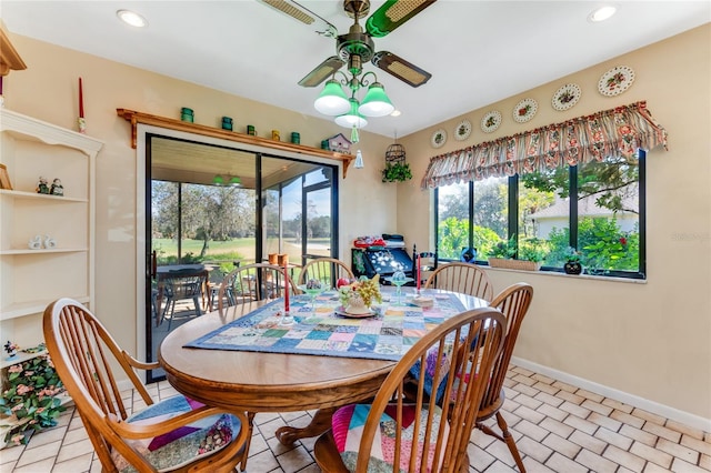 dining space featuring ceiling fan