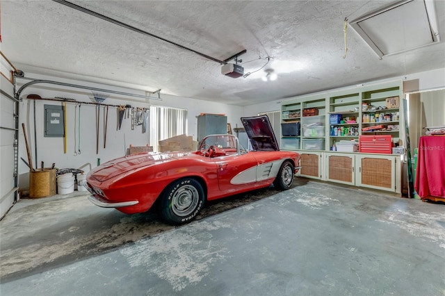 garage featuring a garage door opener and electric panel