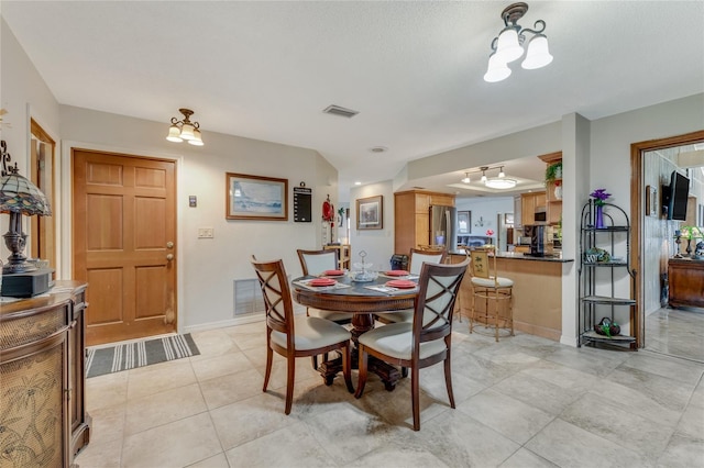 view of tiled dining room